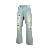 amiri-repaired-bootcut-jeans-light-blue-distressed-denim